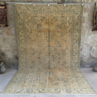Beige 6' x 10' vintage distressed rug with medallion design, handmade in Turkey – Howard.