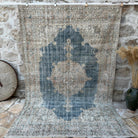 Blue 6' x 10' vintage distressed rug with medallion design, handmade in Turkey – Brent.