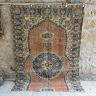 Orange 6' x 8' vintage distressed rug with traditional design, handmade in Turkey – Faris.