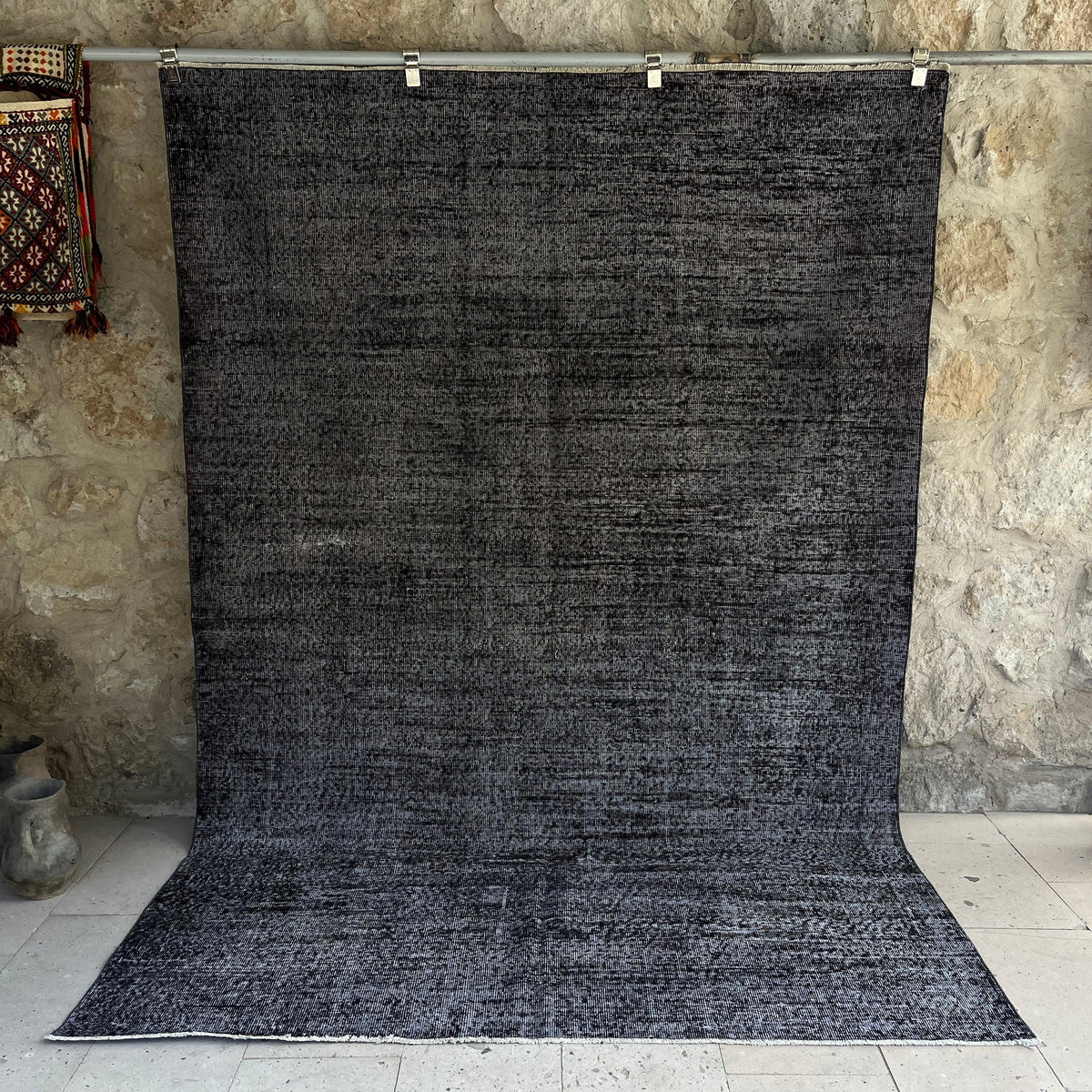 Black 6' x 9' vintage distressed rug with overdyed design, handmade in Turkey – Grover.