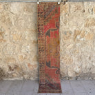 Red 2' x 8' vintage distressed runner rug with traditional design, handmade in Turkey – Codie.