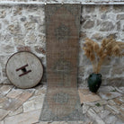 Beige 3' x 10' vintage distressed runner rug with traditional design, handmade in Turkey – Scarlett.