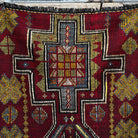 Red 3' x 3' vintage Turkish flatweave rug in wool and cotton, shown on the floor.