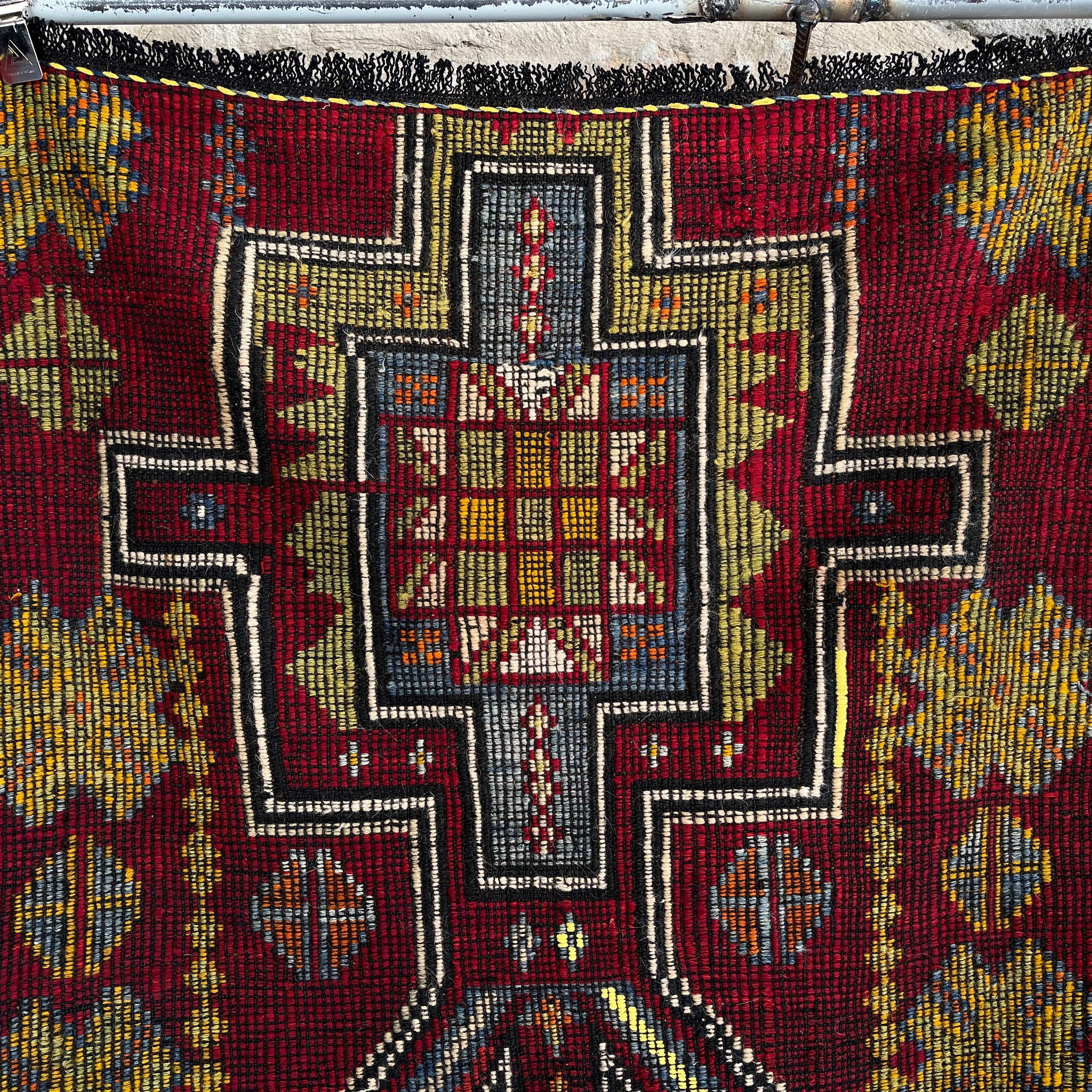 Red 3' x 3' vintage Turkish flatweave rug in wool and cotton, shown on the floor.