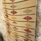Close-up of the beige vintage Turkish flatweave runner rug showing traditional details, flatweave construction, wool and cotton and low pile.