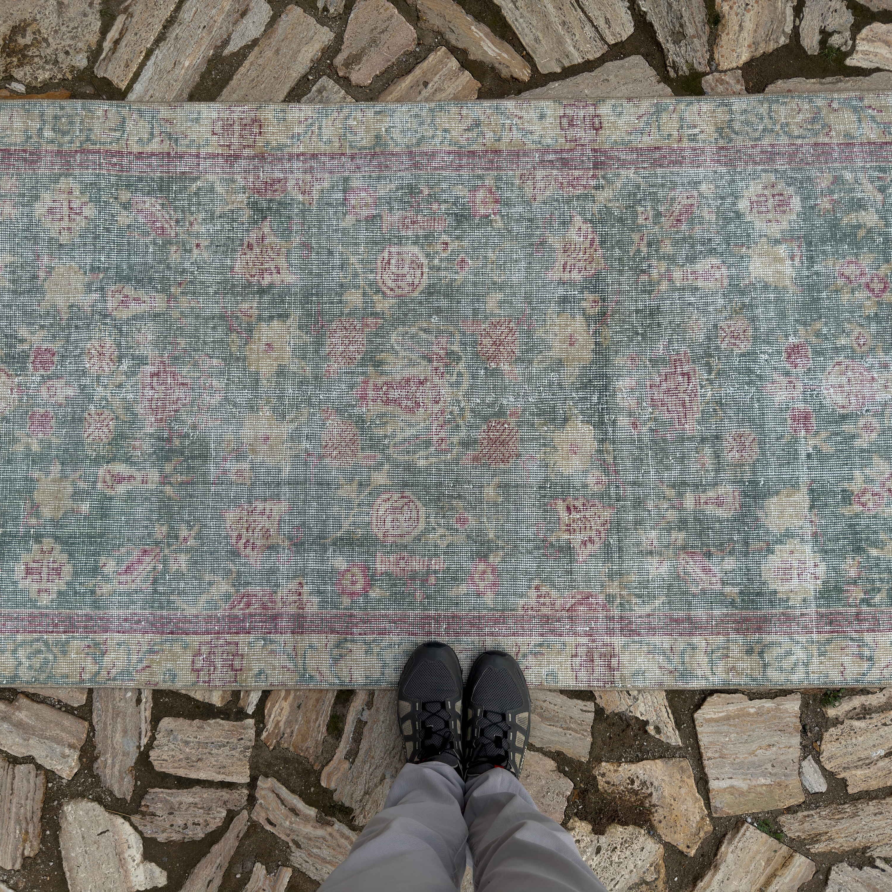 1970s pale blue vintage Turkish floral rug with floral design, hand-knotted weave and low pile.