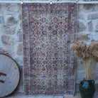 Red 4' x 7' vintage floral rug with floral design, handmade in Turkey – Terza.
