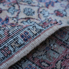 Additional view of the red vintage Turkish floral rug, hand-knotted in wool and cotton.
