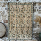 Beige 5' x 7' vintage floral rug with floral design, handmade in Turkey – Craig.