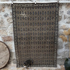 Brown 5' x 7' vintage floral rug with floral design, handmade in Turkey – Anica.