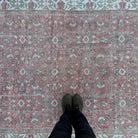 1970s pink vintage Turkish floral rug with floral design, hand-knotted weave and low pile.