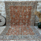 Red 8' x 12' vintage floral rug with floral design, handmade in Turkey – Hero.