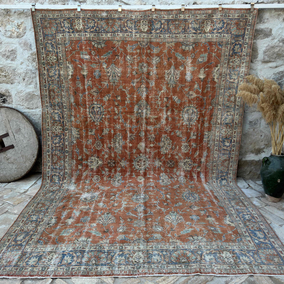 Red 8' x 12' vintage floral rug with floral design, handmade in Turkey – Hero.