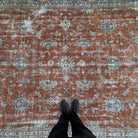 1970s red vintage Turkish floral rug with floral design, hand-knotted weave and low pile.