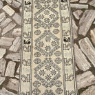 1970s pale blue vintage Turkish floral runner rug with traditional design, hand-knotted weave and low pile.