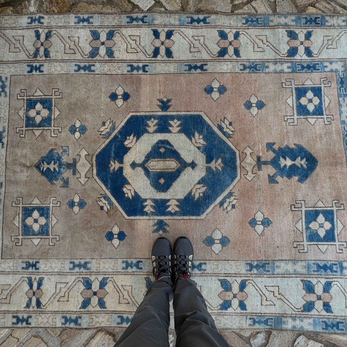 1970s pale blue vintage Turkish geometric carpet with medallion design, hand-knotted weave and low pile.