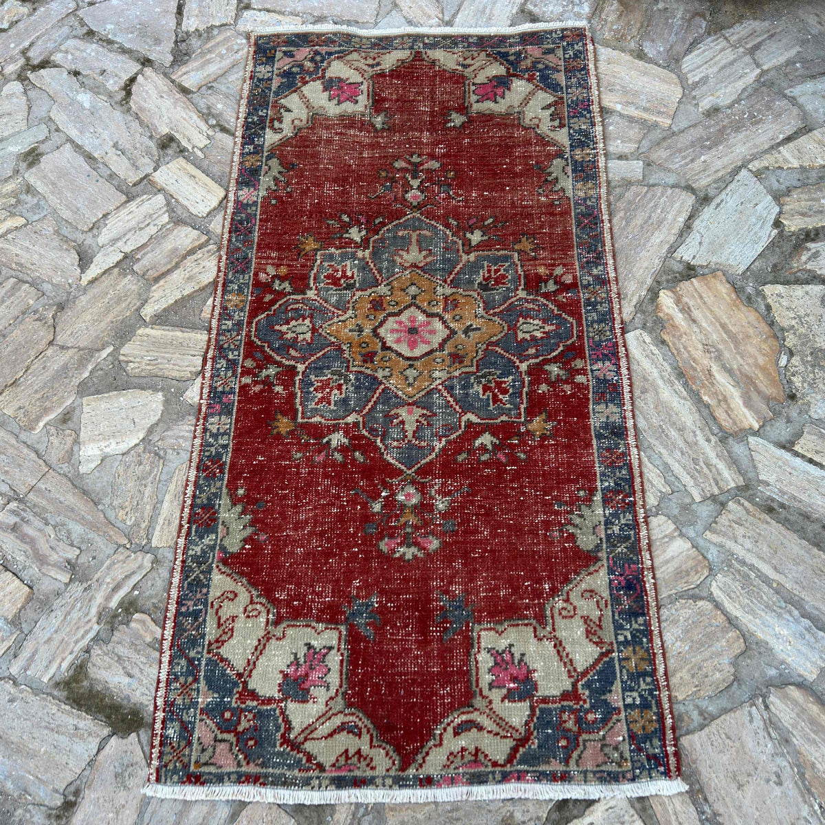 Red 3' x 5' vintage Turkish geometric rug in wool and cotton, shown on the floor.