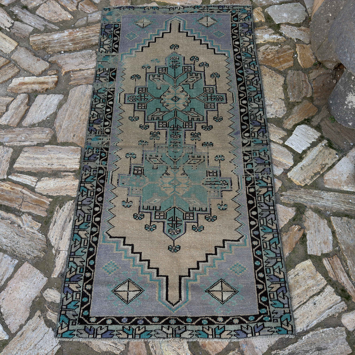 Pale Purple 3' x 6' vintage Turkish geometric rug in wool and cotton, shown on the floor.