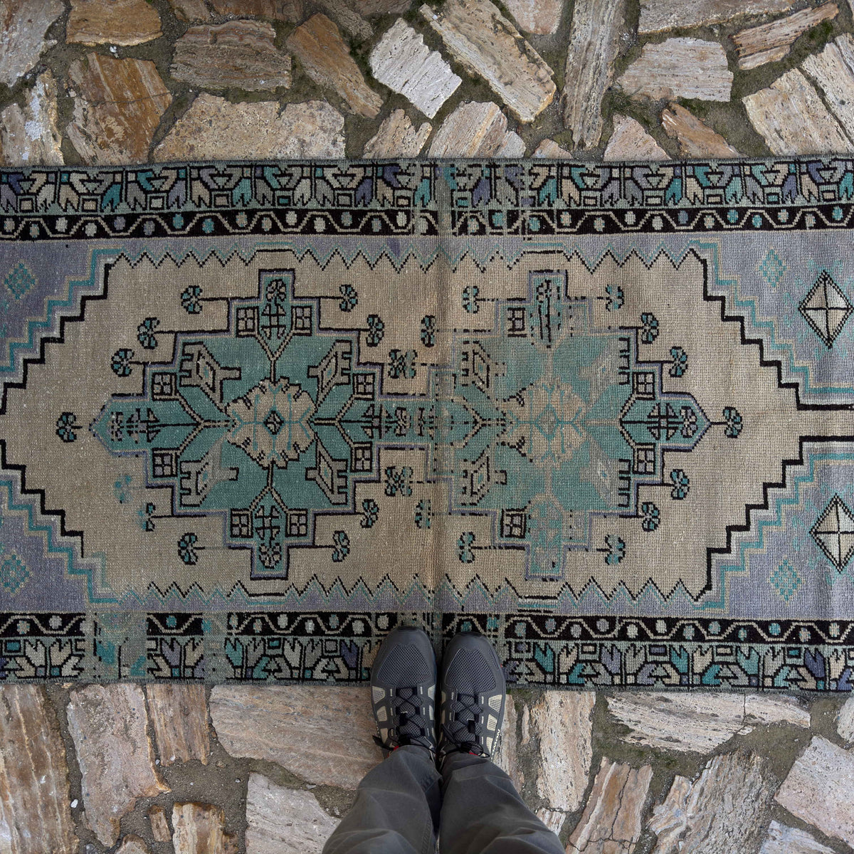 1970s pale purple vintage Turkish geometric rug with medallion design, hand-knotted weave and low pile.