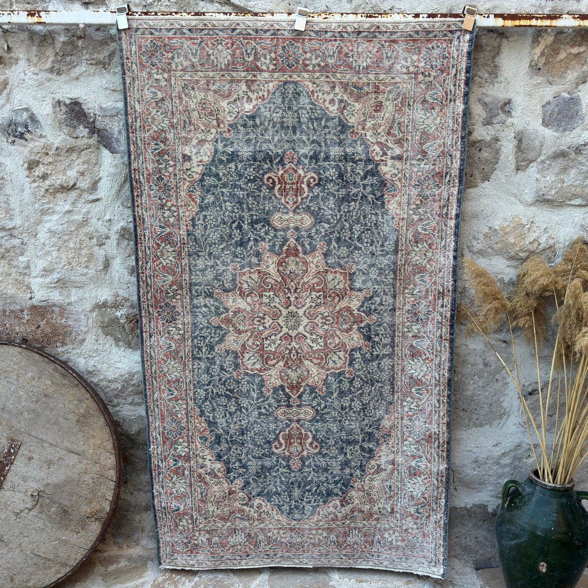 Blue 4' x 7' vintage geometric rug with medallion design, handmade in Turkey – Karon.