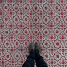 1970s red vintage Turkish geometric rug with geometric design, hand-knotted weave and low pile.