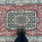 1970s red vintage Turkish geometric rug with traditional design, hand-knotted weave and low pile.