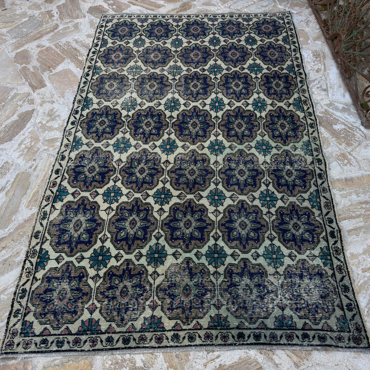Blue 5' x 8' vintage Turkish geometric rug in wool and cotton, shown on the floor.