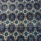 1970s blue vintage Turkish geometric rug with geometric design, hand-knotted weave and low pile.
