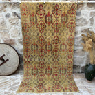 Yellow 5' x 9' vintage geometric rug with floral design, handmade in Turkey – Robbyn.