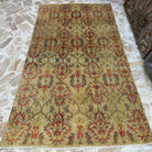Yellow 5' x 9' vintage Turkish geometric rug in wool and cotton, shown on the floor.