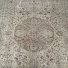 1970s brown vintage Turkish geometric rug with medallion design, hand-knotted weave and low pile.