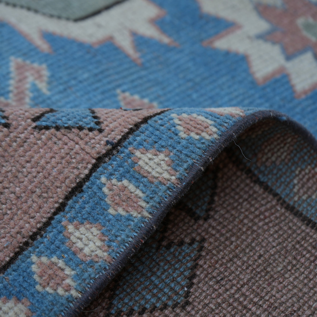 Additional view of the beige vintage Turkish geometric rug, hand-knotted in wool.