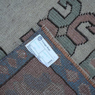 Beige 6' x 7' vintage Turkish geometric rug from the 1970s with geometric design.