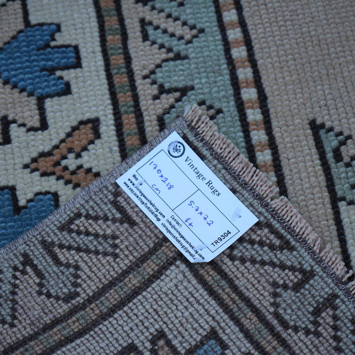Beige 6' x 7' vintage Turkish geometric rug from the 1970s with geometric design.