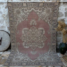 Pale Red 6' x 9' vintage geometric rug with medallion design, handmade in Turkey – Kaysen.