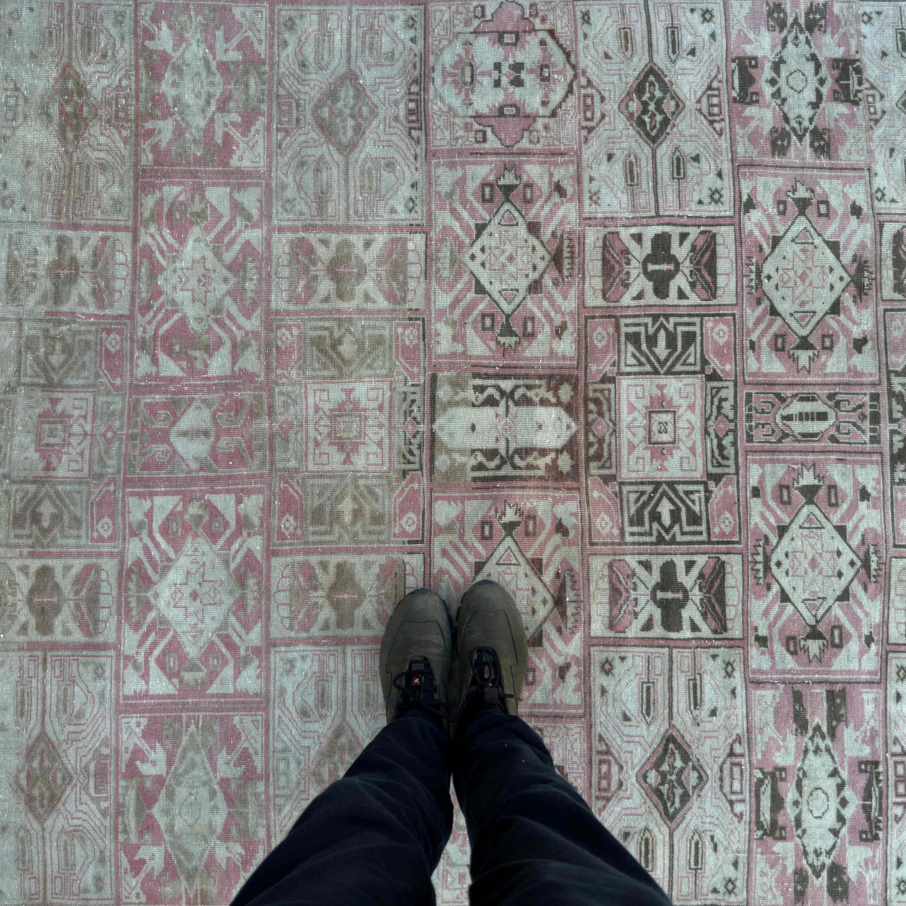 1970s pink vintage Turkish geometric rug with neutral design, hand-knotted weave and low pile.