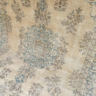 Blue 8' x 12' vintage Turkish geometric rug in wool and cotton, shown on the floor.