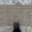 1970s pink vintage Turkish handmade runner rug with medallion design, hand-knotted weave and low pile.