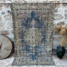 Blue 5' x 8' vintage kayseri rug with traditional design, handmade in Turkey – Faye.
