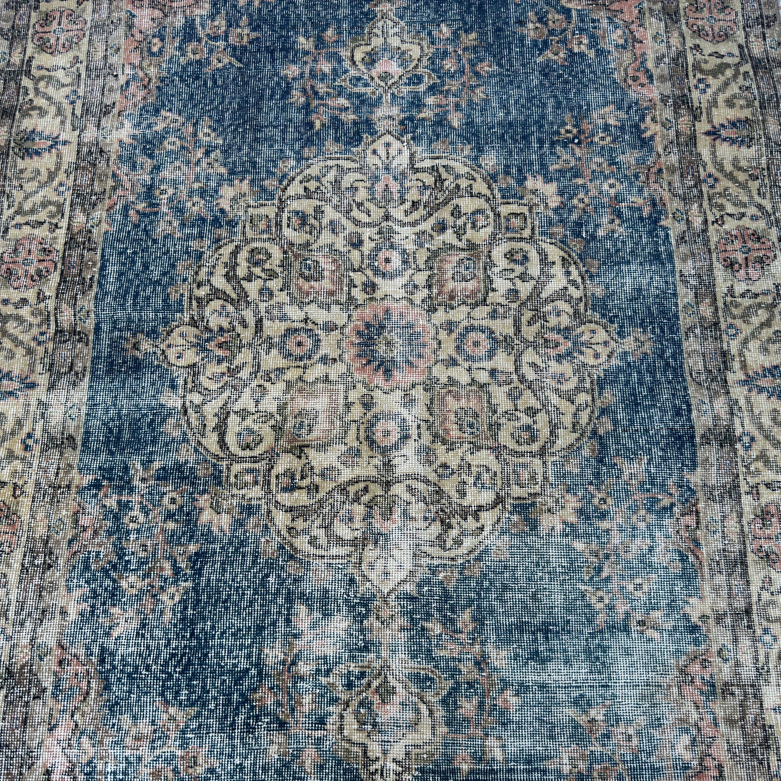 1970s blue vintage Turkish kayseri rug with traditional design, hand-knotted weave and low pile.