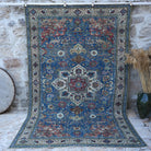 Blue 6' x 10' vintage kayseri rug with floral design, handmade in Turkey – Melinde.