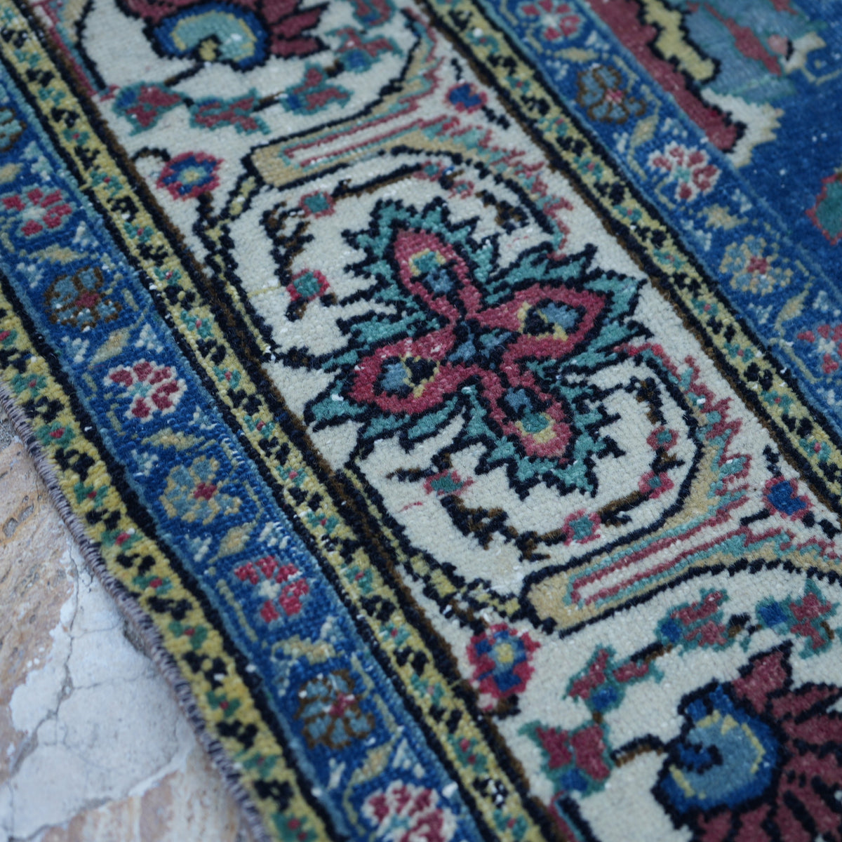 Blue 6' x 10' vintage Turkish kayseri rug in wool and cotton, shown on the floor.