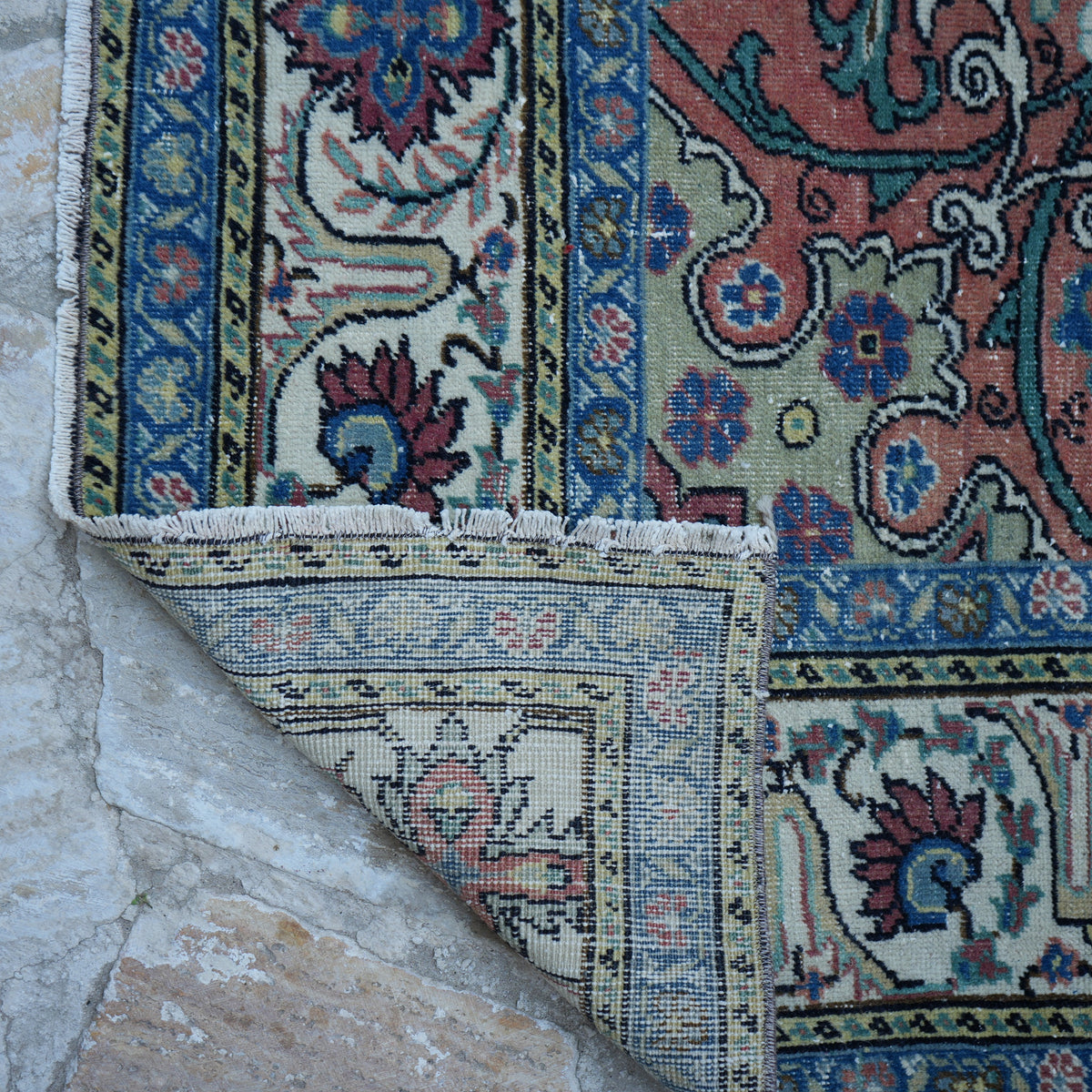 1970s blue vintage Turkish kayseri rug with floral design, hand-knotted weave and low pile.
