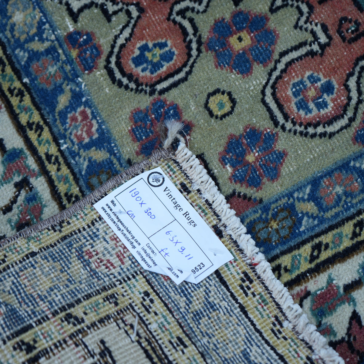 Blue 6' x 10' vintage Turkish kayseri rug from the 1970s with floral design.