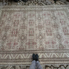 1970s pale beige vintage Turkish kayseri rug with neutral design, hand-knotted weave and low pile.
