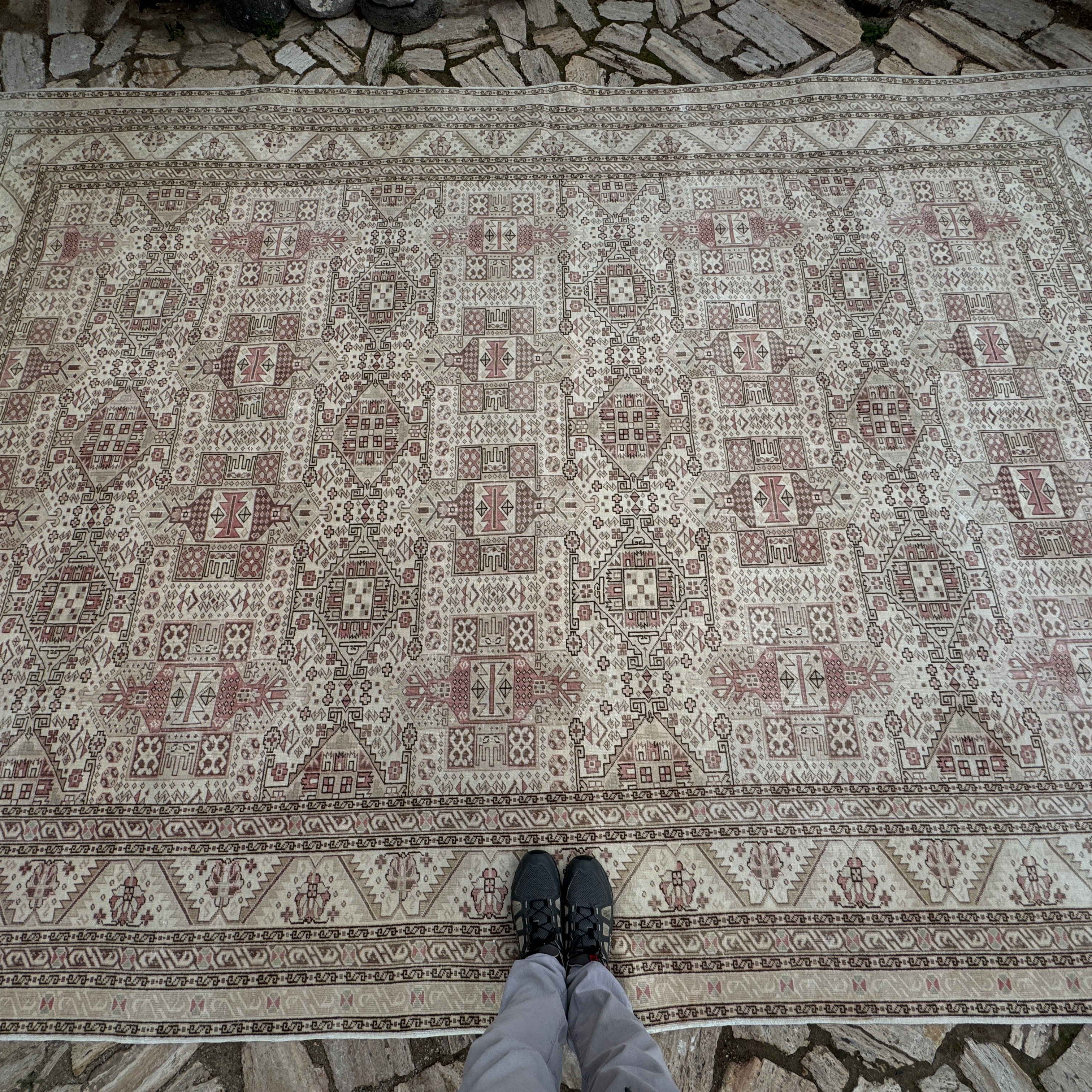 1970s pale beige vintage Turkish kayseri rug with neutral design, hand-knotted weave and low pile.