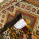 Close-up of the beige vintage Turkish kilim rug showing traditional details, flatweave construction, wool and cotton and low pile.