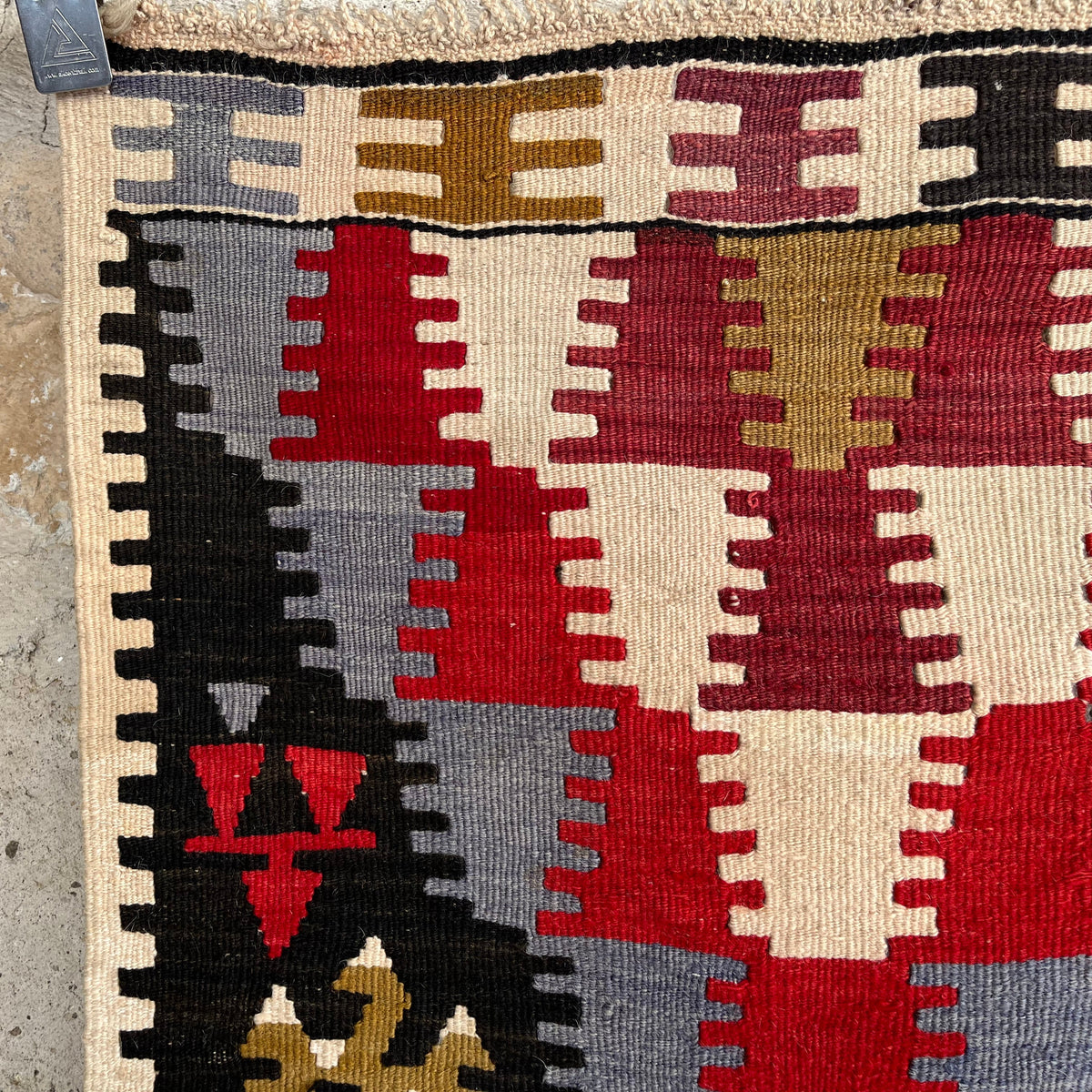 Blue 2' x 3' vintage Turkish kilim rug in wool and cotton, shown on the floor.