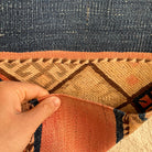 1970s pink vintage Turkish kilim rug with traditional design, flatweave construction and low pile.