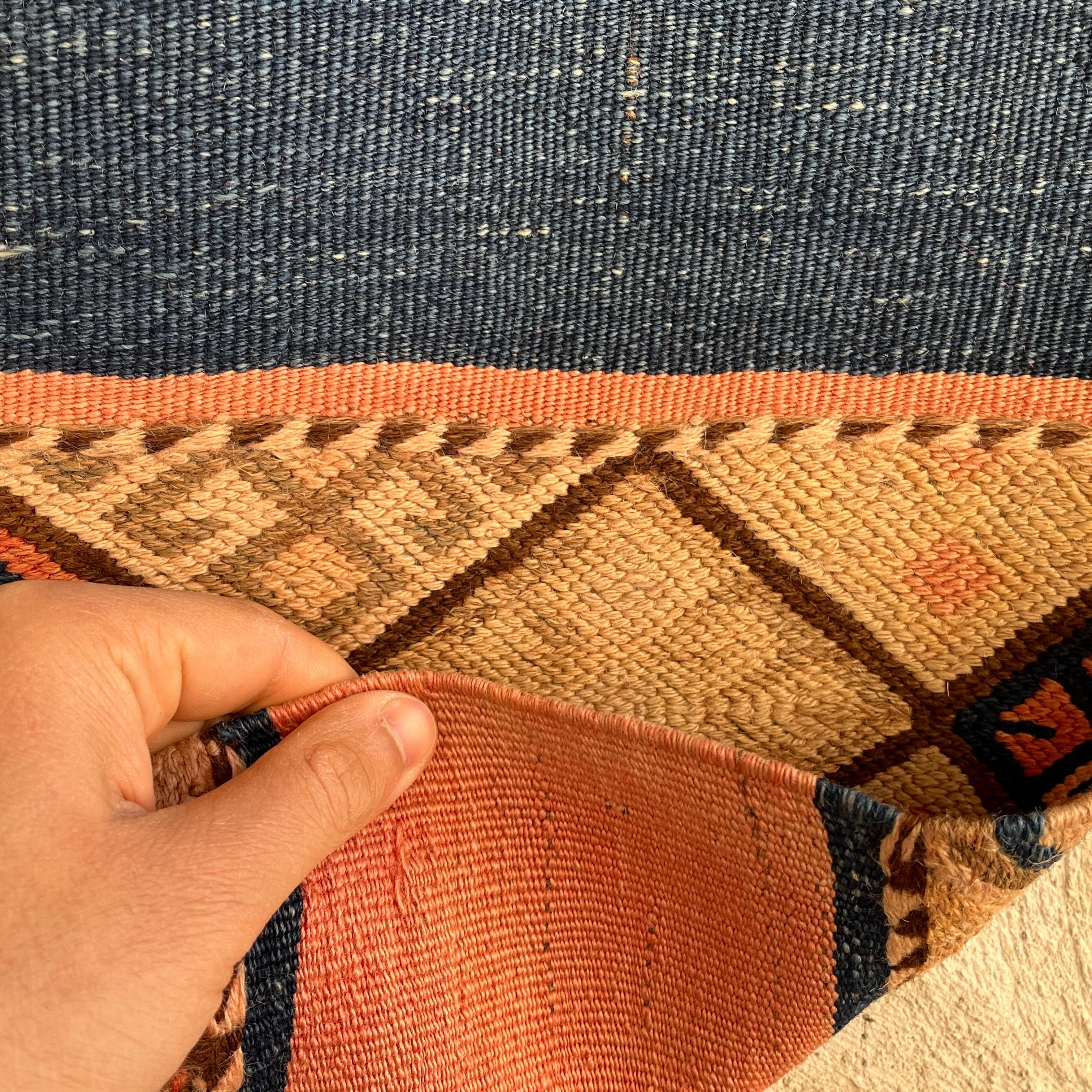 1970s pink vintage Turkish kilim rug with traditional design, flatweave construction and low pile.